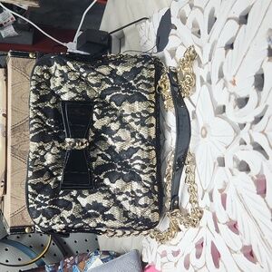 Black and gold lace Aldo crossbody purse